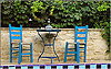 Table and chairs by the pool